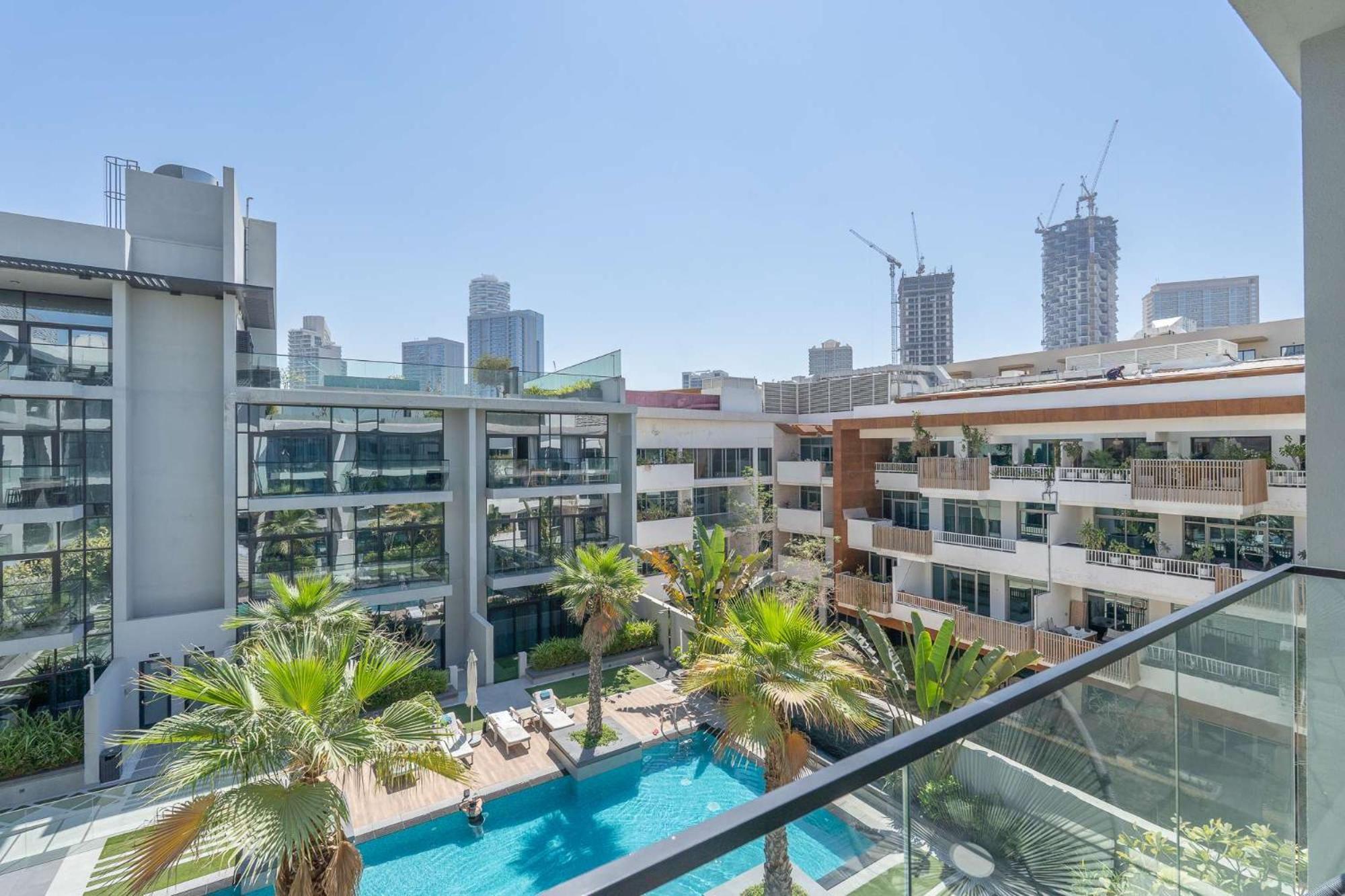 Modern Bali Vibes With Pool And Palm Tree Views Jvc Dubai